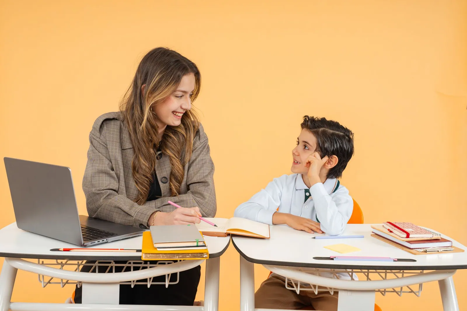 A mentor and a client talking through a plan